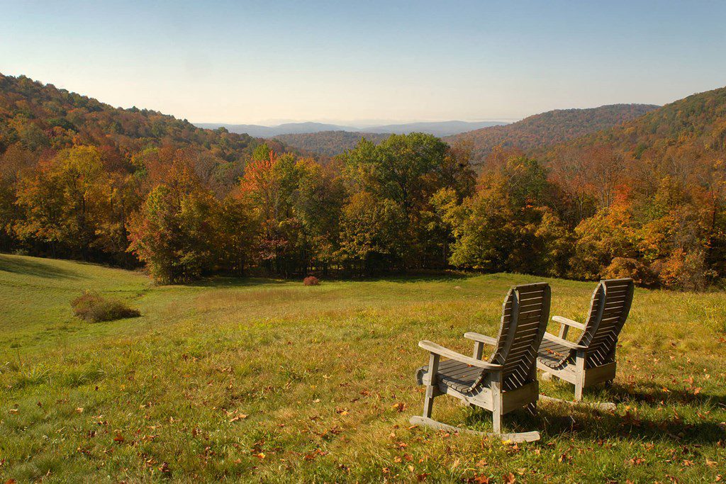 Two chairs looking at mountain