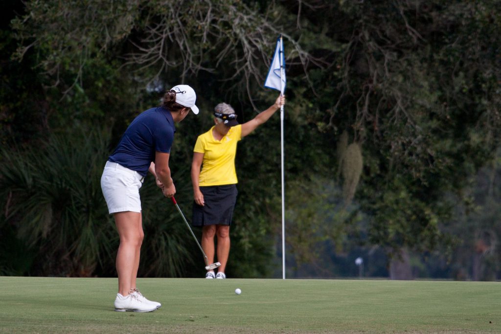 golfer putting on smooth greens